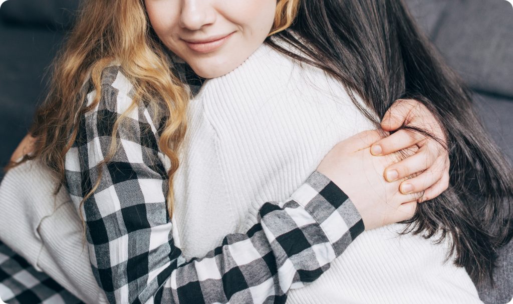 OurTNBC - crop females hugging home